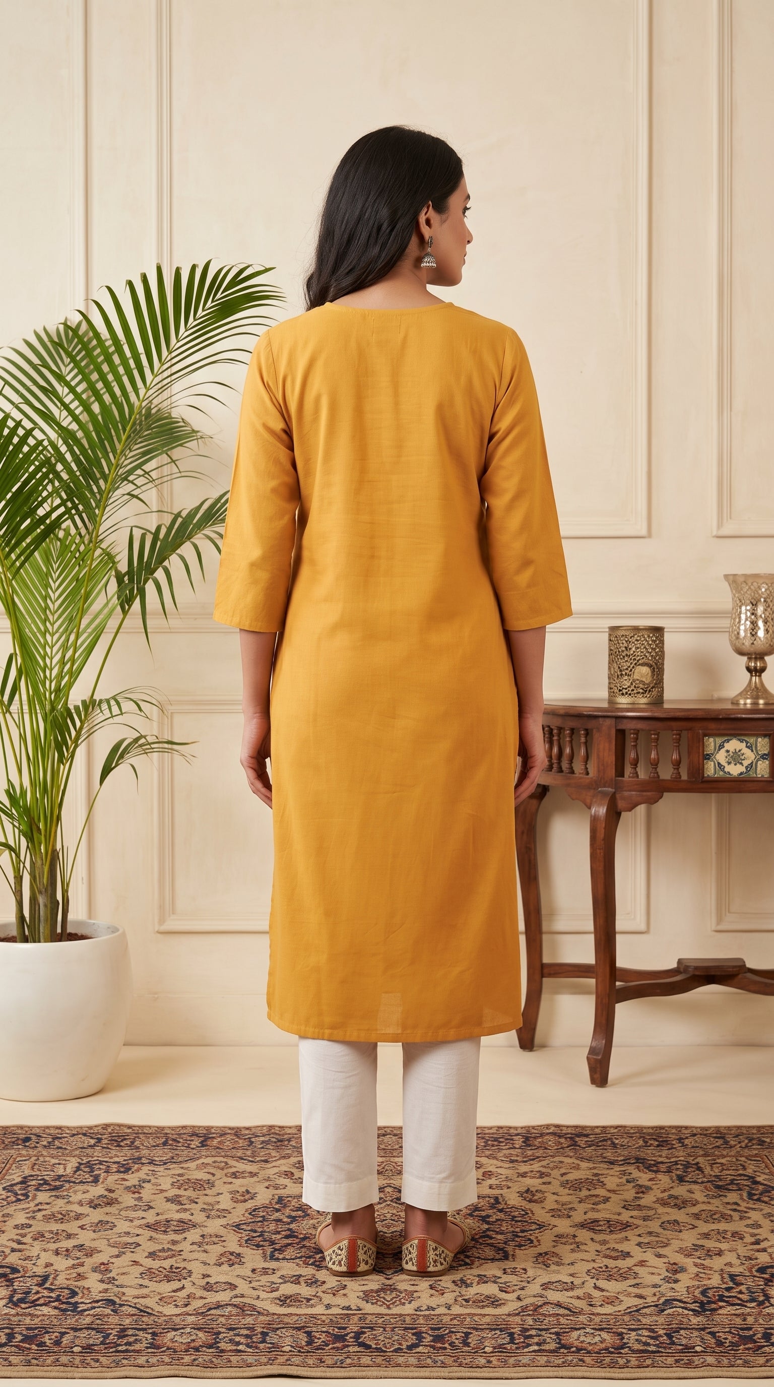 Paneri Women's Mustard Yellow Embroidered Cotton Kurti